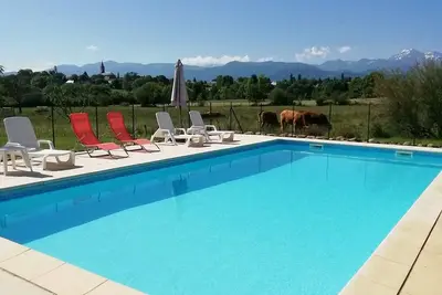 Image de Gite Montaigu  with large pool and stunning mountain views. Sleeps up to 4