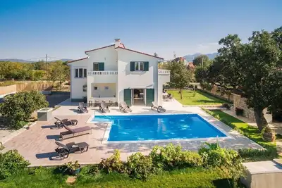 Image de Maison de vacances Sestanovac pour 1 - 11 personnes avec 4 chambres à coucher - Maison de vacances