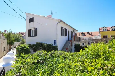 Image de Appartement de vacances avec balcon, air conditionné et internet