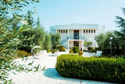 Image de Bilocale in Villa con Piscina