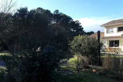 Image de Maison avec deux terrasses (sud et nord) et accès direct à la piste cyclable.