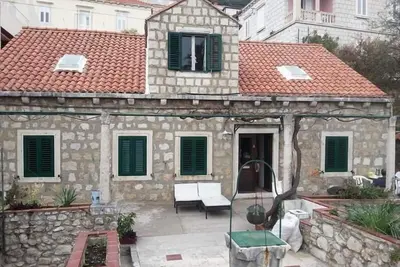 Image de Appartement de vacances Dubrovnik pour 1 - 9 personnes avec 4 chambres à coucher - Maison mitoyenne