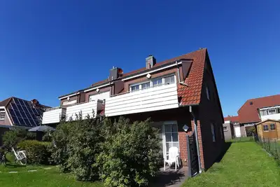 Image de Bright apartment, south-facing balcony, max 2 adults + children, close to the beach, close to the center, 2 e-bikes