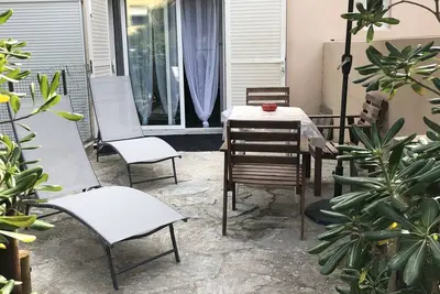 Garden level studio in private residence near the beach