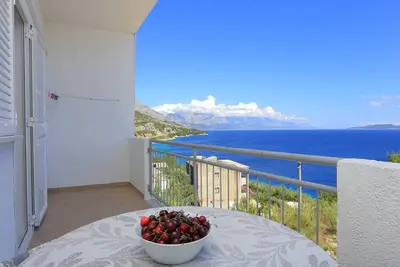 Image de Appartement d'une chambre avec le balcon et la vue sur le mer Lokva Rogoznica, Omis (A-17645-b)