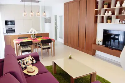 Image de Luxueux appartement neuf avec jardin attenant, 277m2, proche de la plage