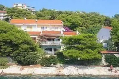 Image de Appartement de vacances Trogir pour 1 - 4 personnes avec 2 chambres à coucher - Maison jumelée