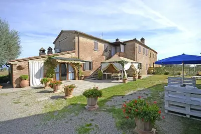 Image de Maison de vacances à Creti avec 5 chambres à coucher, 10 couchages