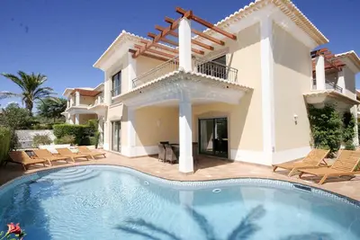 Image de Deluxe 3 Bedroom Villa w/ Heated Pool, Walking distance to Beach, Wifi, A/C