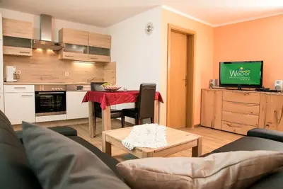 Appartement dans une ambiance familiale avec aire de jeux pour enfants