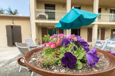 Image de Appartement 100 m2 plein pieds grande terrasse vue sur jardin arboré