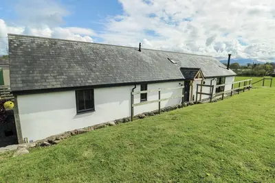 Image de Ty Cuddfan, pet friendly, with open fire in Llangoed