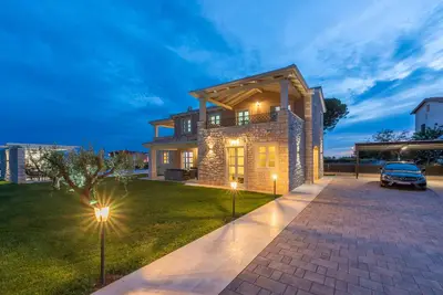 New stone villa with a pool