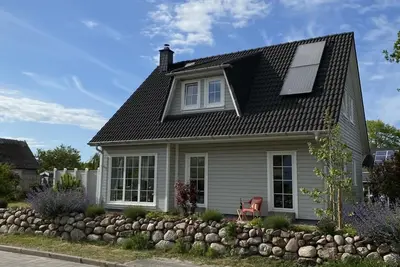 Image de Hus Hygge - garden, terrace, barbecue, sun loungers, Wlan, fireplace, sauna, close to the Bodden, Baltic Sea 6km away, Wlan