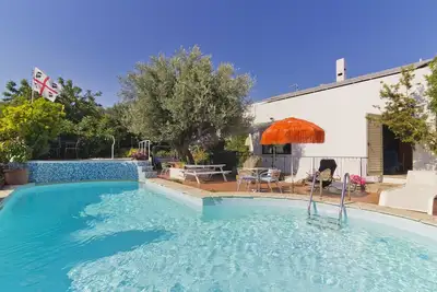Image de Appartement de vacances \"Casa Ginepro\" dans une villa avec Wi-Fi, cour et piscine