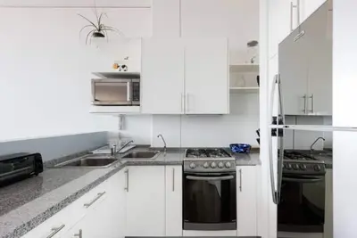 Image de Loft in fifth floor with great views to green and the city and a roof garden too