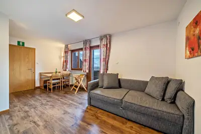 Image de Appartement \"Kammerhof Apfel\" avec vue sur les montagnes, Wi-Fi, balcon et jardin