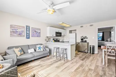 Image de Coastal dream with pool, beach access, balcony, ocean view, & bright interior