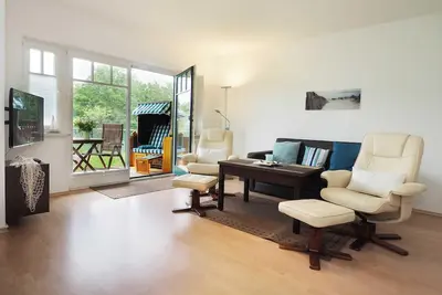 Image de Haus am Schloonsee 06 - quiet location near the beach with terrace & beach chair