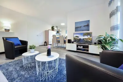 Image de Sonnenpark 05 - modern furnishings and terrace with beach chair