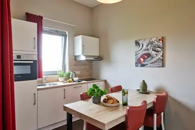 Image de Studio pour 2 personnes avec lit double