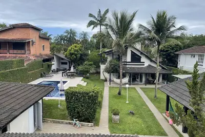 Image de Grande maison à Barra do Una - terre 980m2 290m de la plage jusqu'à 21 lits