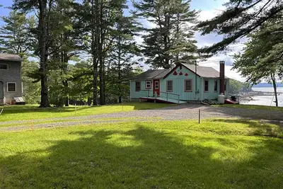 Image de Bayside Road - Waterfront Cottage sur une belle marée Cove