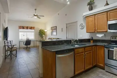 Beautiful 1 Bdrm Villa! Overlooks Pool with 44' Deep 13'6\" High Attached Garage
