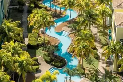 Image de Appartement spectaculaire et exquis Ă Aquatika Beach Resort