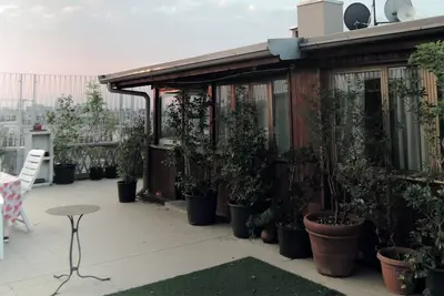 Image de Woodhouse/ Iconic city center rooftop apartment