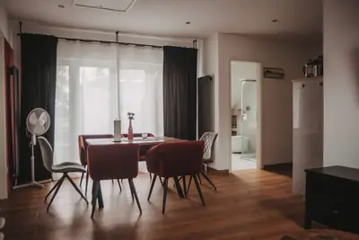 Image de Appartement moderne de 3 pièces avec terrasse sur le toit et places de parking