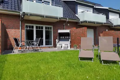 Image de Ferienwohnung im Erdgeschoss für 2 Personen mit Terrasse und Garten in Norden