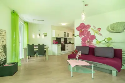 Image de Appartement de vacances \"Orchidée\" avec grande terrasse sur vue sur lac, barbecue, Wi-Fi et Tv