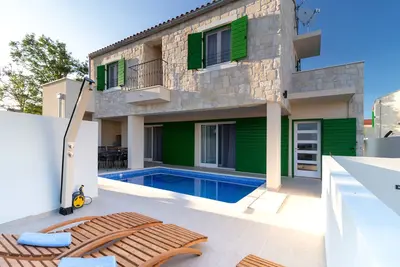 Image de Villa \"Mletak\"New villa with heated pool and jacuzzi near the beach