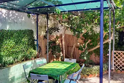 Image de House of Ulysses: private garden and parking.