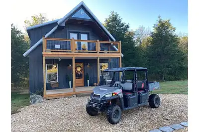 Image de Unique/modern, secluded cabin on 95 river front acres/utv/kayaks & hot tub