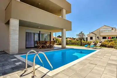 Image de Joli appartement avec piscine privée, climatisation, Wifi, Tv, terrasse et parking