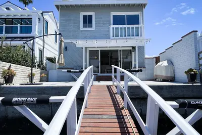 Image de Newport Island home with dock and sunset patio
