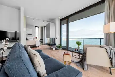 Image de Baltic Sea vacation apartment right on the beach, panoramic windows, sauna and two terraces