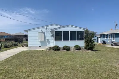 Image de Hot tub, 2 min. Walk to Beach! Flex Stays! Cozy 3 bed 1 full bath 2 half baths