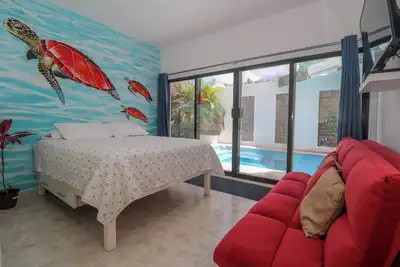Image de Studio Tortugas with outdoor pool, grill, palapa, mezzanine floor. Kids welcome