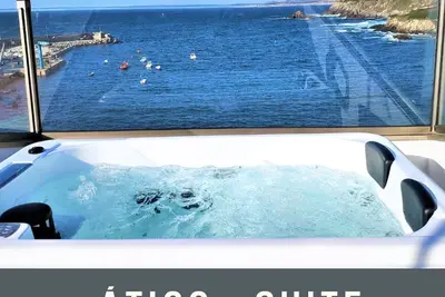 Image de In Caión: Attic-Suite with 2 terraces and Jacuzzi on the seafront