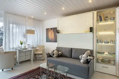 Image de Appartement de vacances moderne \"Urs\" avec vue sur les montagnes, balcon, sauna et piscine