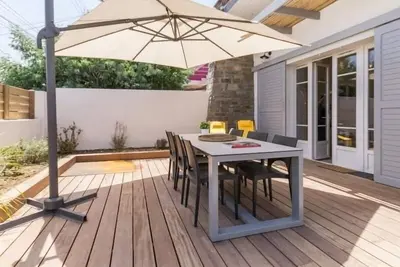 Image de Gîte cosy bord de mer avec spa à 5 min de la plage et commerces, 2 terrasses, idéal famille et bébé