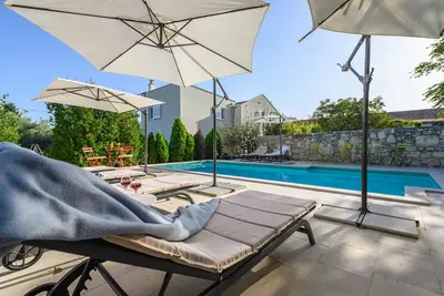 Image de Villa Sole ⭐⭐⭐ ⭐⭐ a family friendly villa with a stunning view over the sea