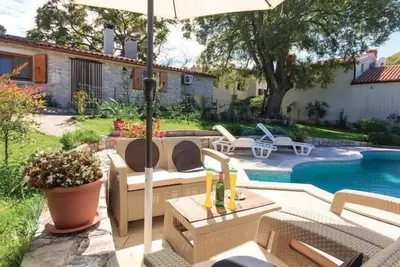 Image de Maison de vacances Rakalj pour 1 - 4 personnes avec 1 chambre à coucher - Maison de vacances