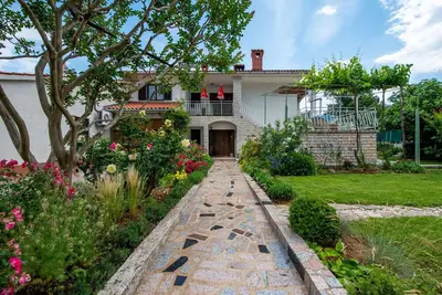Image de Apartement Vinez eine grĂĽne Gartenoase