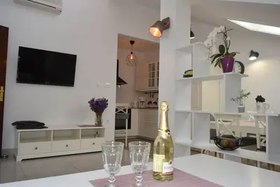 Appartement de trois chambres prés de la plage Barbat, Rab (A-4973-a)