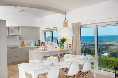 Step inside this gorgeous retreat where upside down living takes full advantage of the sea views.