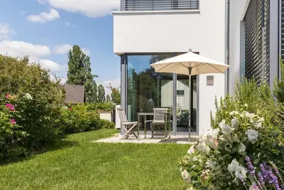 Image de Appartement de vacances design \"Mettnau\" près du lac de Constance avec Wi-Fi, terrasse et jardin